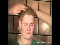 Bald whore using shit as shampoo